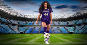 Kolo Suliafu in Washington Huskies soccer uniform controlling the ball on a stadium field