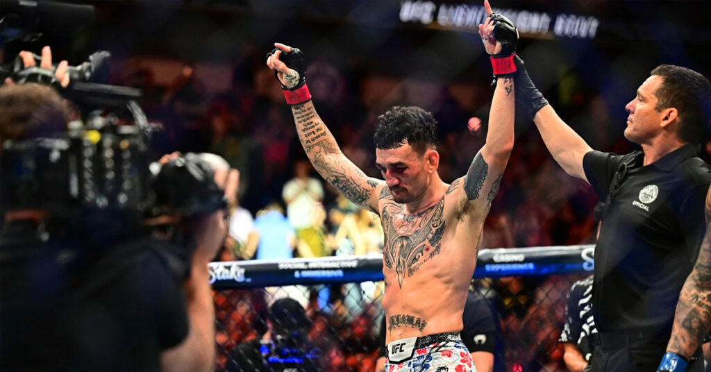 Max Holloway celebrates BMF title defense at UFC 318 after defeating Dustin Poirier