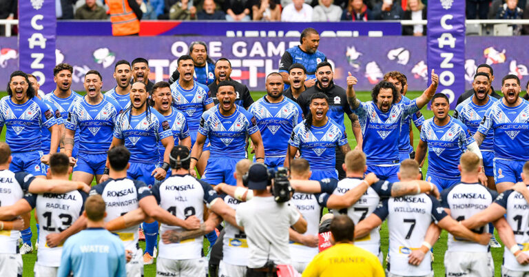 Toa Samoa rugby league team performing the Siva Tau before a match against England at the Rugby League World Cup
