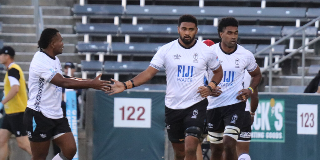 Fiji rugby team Flying Fijians celebrating on the field during Pacific Nations Cup 2025 match