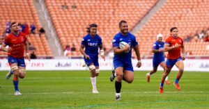 Alamanda Motuga scoring try for Manu Samoa in Rugby World Cup 2027 qualifier against Chile, showcasing Polynesian rugby power