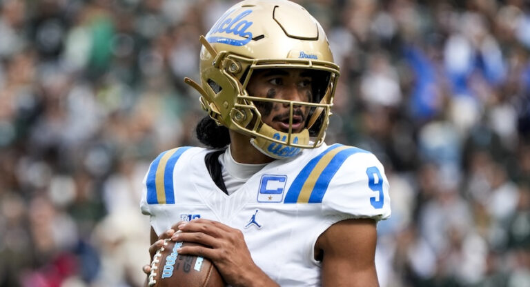 UCLA Bruins quarterback Nico Iamaleava in full uniform during the 2025 season, ruled out of tonight's game vs No. 1 Ohio State due to concussion protocol