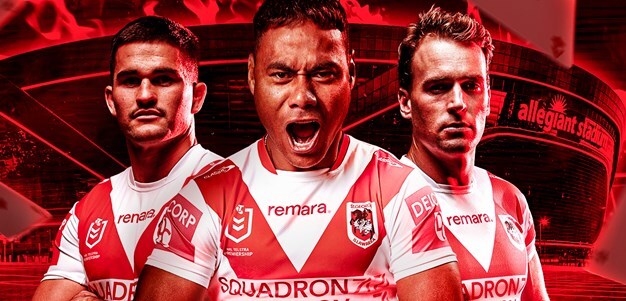 St. George Illawarra Dragons players in 2024 jerseys standing in front of Allegiant Stadium in Las Vegas for the NRL season opener.