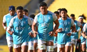 Moana Pasifika rugby players running onto the field during a training session focused on intensity