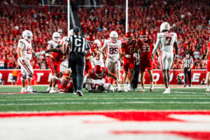 Utah Utes defenders tackle an Arkansas Razorbacks player near the goal line during Utah’s 43–10 home victory.