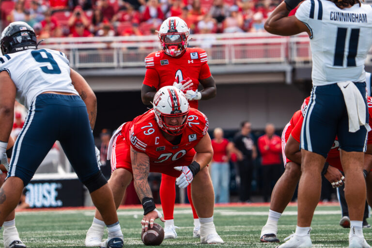 Utah Utes offense lines up against the Utah State Aggies during the Battle of the Brothers at Rice-Eccles Stadium.