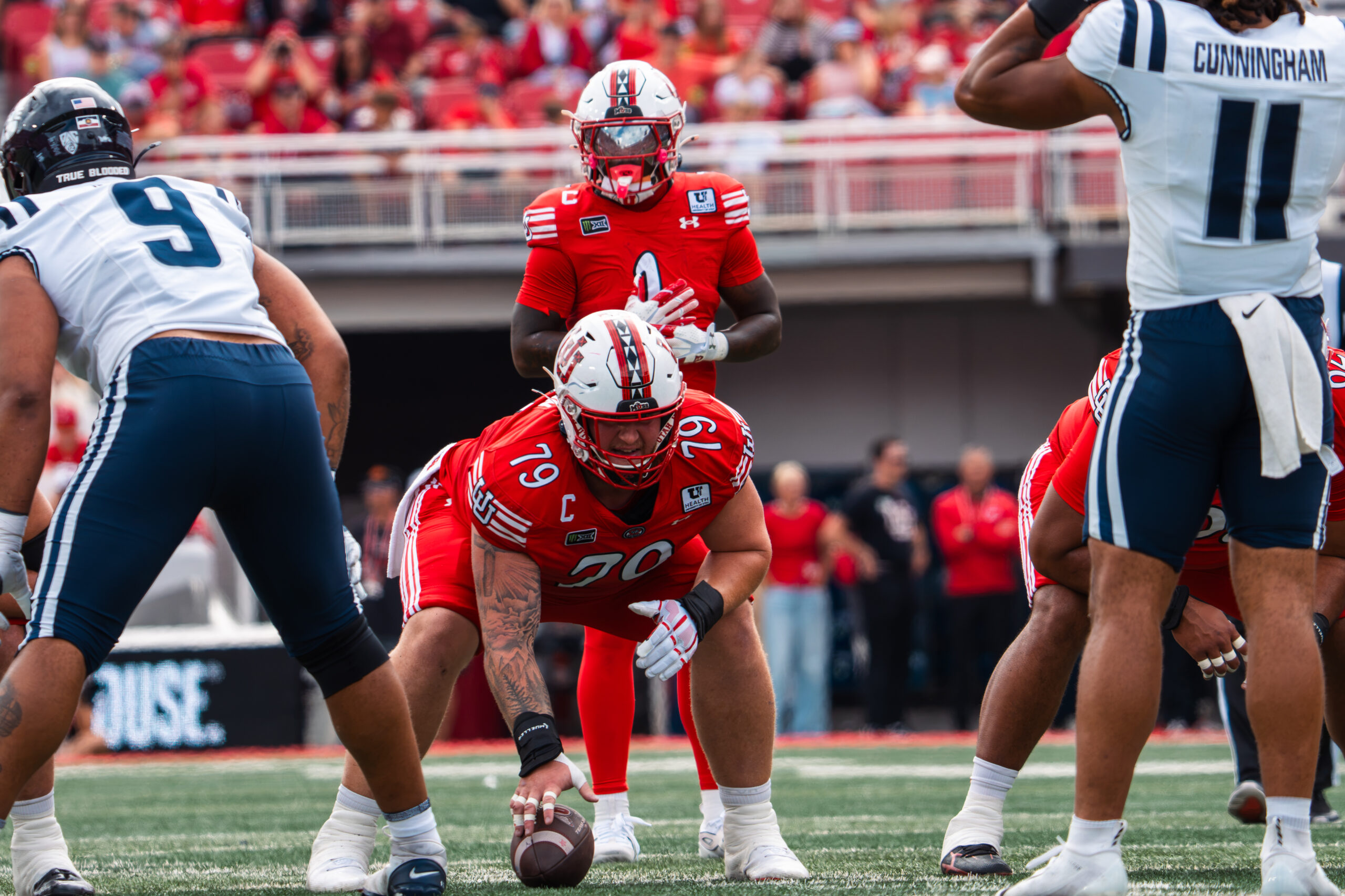 Utah Utes offense lines up against the Utah State Aggies during the Battle of the Brothers at Rice-Eccles Stadium.