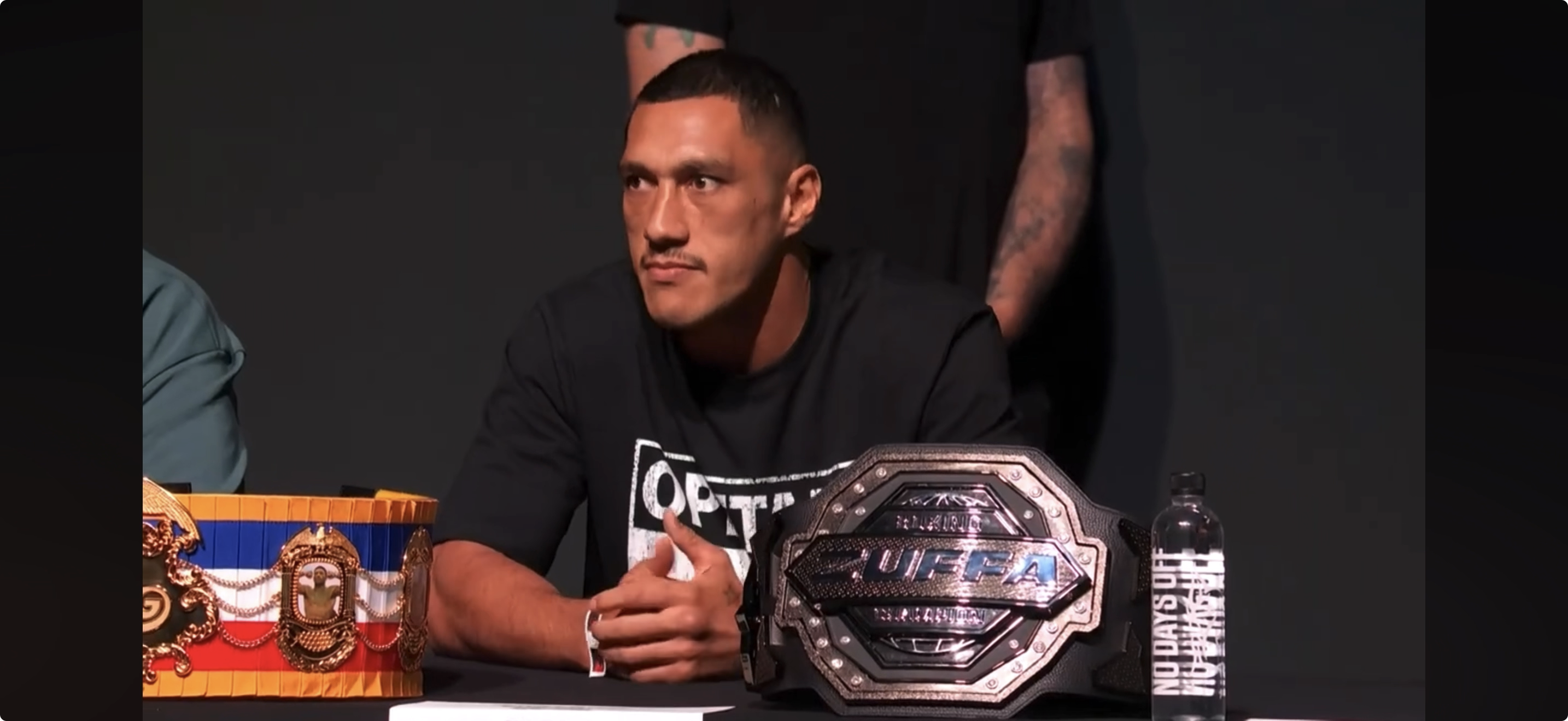 Cruiserweight champion Jai Opetaia at the Las Vegas press conference table beside his Zuffa Boxing championship belt