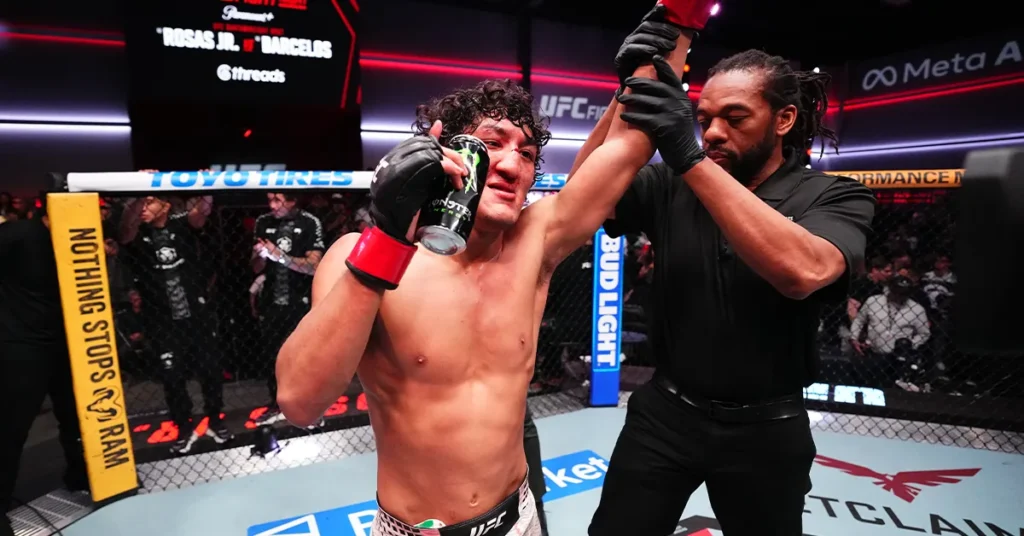 Raul Rosas Jr. has his hand raised by the referee after his fifth-round TKO of Raoni Barcelos at UFC Fight Night, Meta APEX, Las Vegas