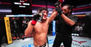 Raul Rosas Jr. has his hand raised by the referee after his fifth-round TKO of Raoni Barcelos at UFC Fight Night, Meta APEX, Las Vegas